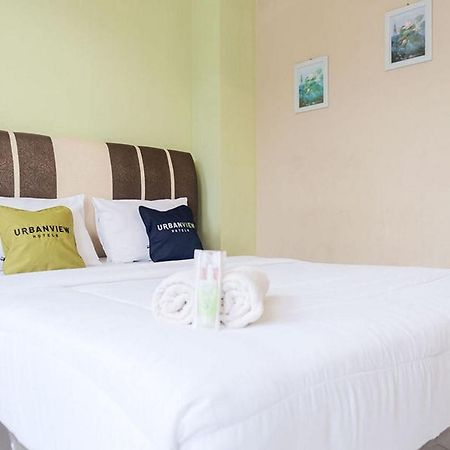Urbanview Hotel Ta Ke Jelutung Puncak Jambi Bagian luar foto