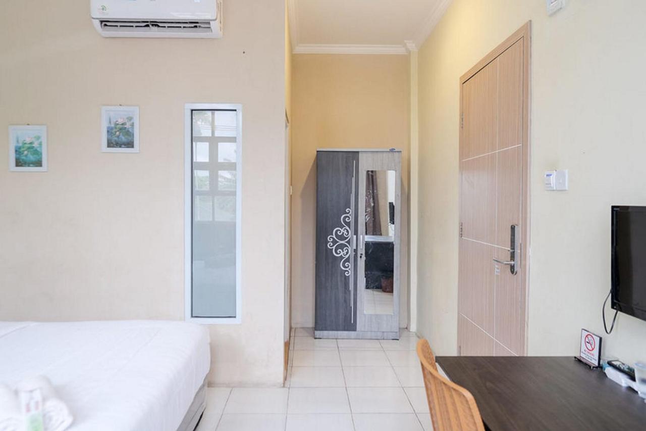 Urbanview Hotel Ta Ke Jelutung Puncak Jambi Bagian luar foto