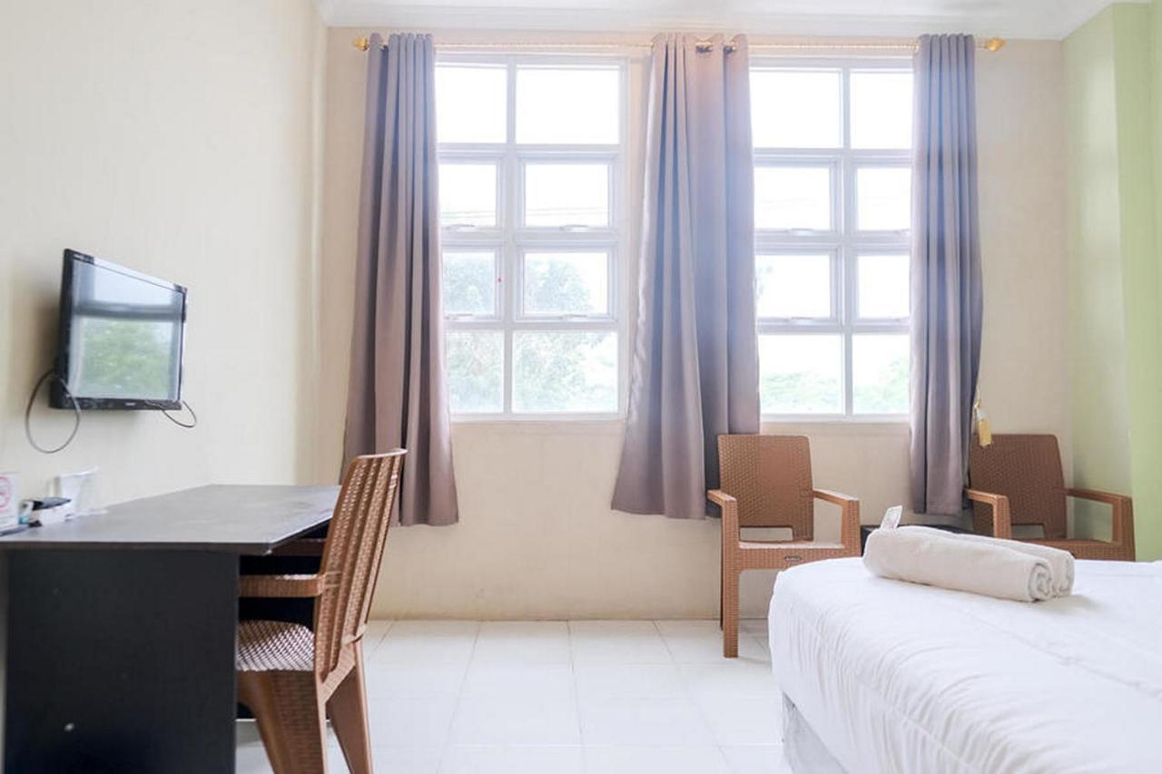 Urbanview Hotel Ta Ke Jelutung Puncak Jambi Bagian luar foto