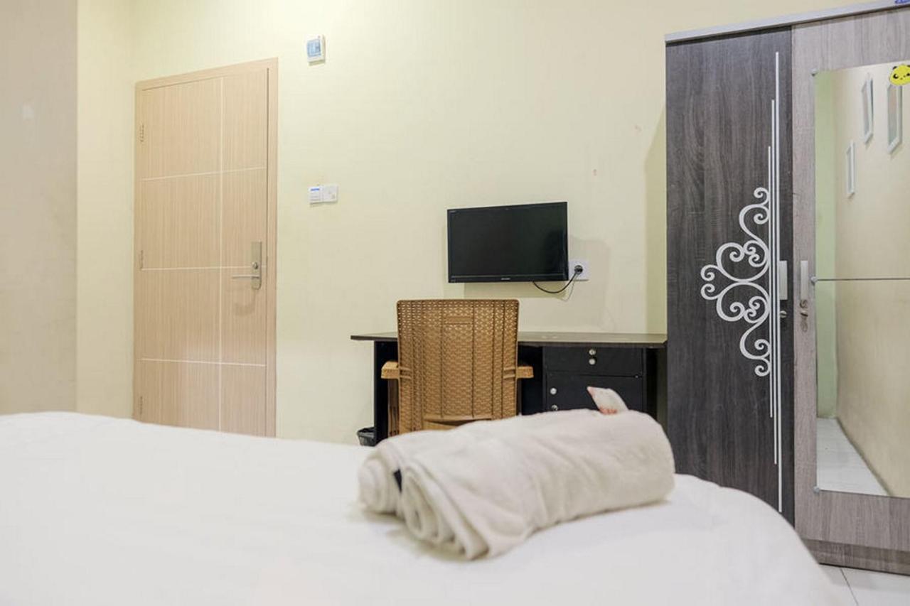 Urbanview Hotel Ta Ke Jelutung Puncak Jambi Bagian luar foto